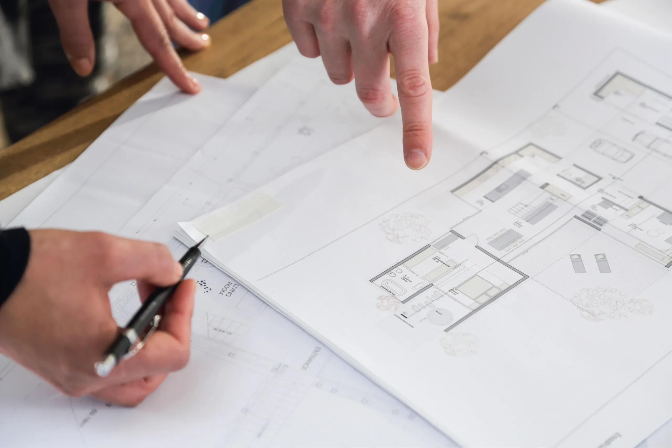 Contractor reviewing outdoor project plans